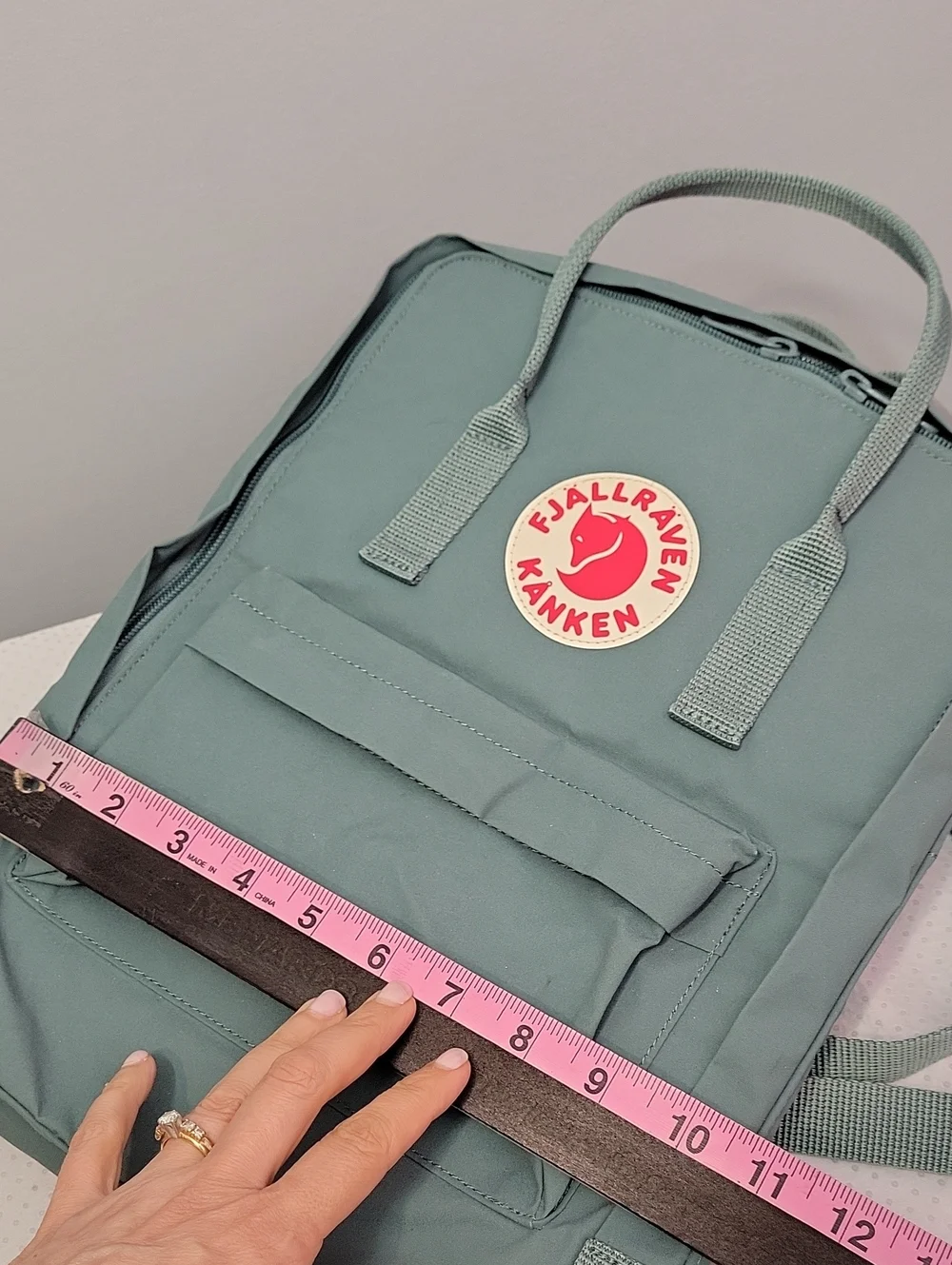 Fjallraven Kanken Backpack in Teal with Red Logo